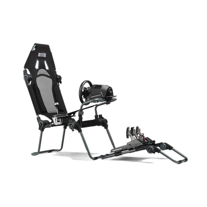 Next Level Racing F-GT Lite cockpit met stuur en pedalen – complete instapoplossing voor simracers.